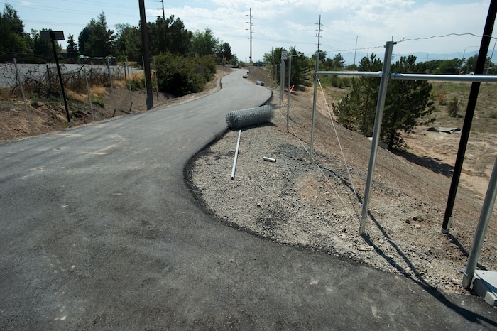 (Rick Egan | The Salt Lake Tribune) Chain-link fence waits to line the sides of a new segment of Parley's Trail in Salt Lake City on Wednesday, Aug. 30, 2017.
