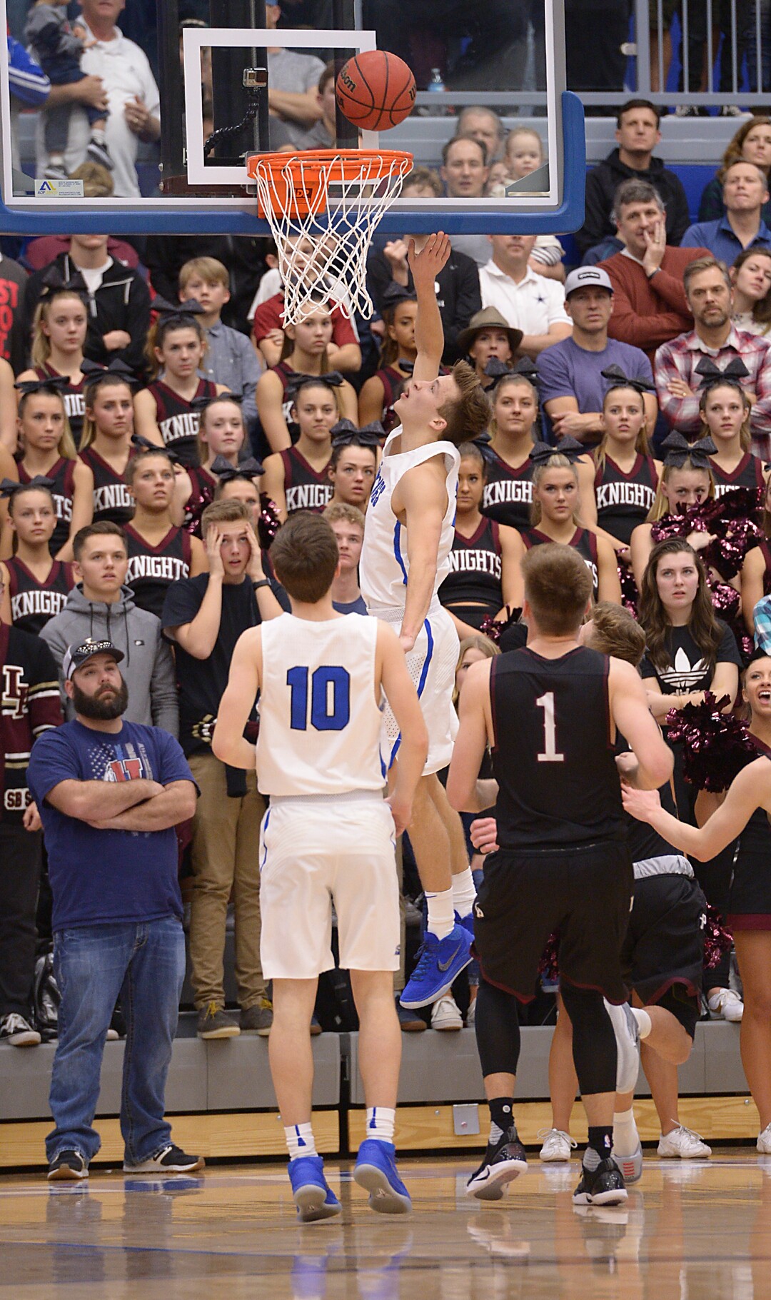 (Leah Hogsten  |  The Salt Lake Tribune)  Pleasant Grove's Casey Brown hits the bucket. Pleasant Grove High School boys' basketball team leads Lone Peak High School 26-20 during their game Friday, January 26, 2018 in Pleasant Grove. 