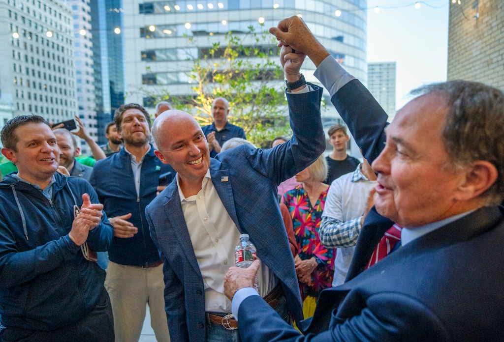 (Rick Egan | The Salt Lake Tribune) Gubernatorial candidate Gov. Spencer Cox, center, celebrates winning the GOP nomination with former Gov. Gary Herbert, right, in Salt Lake City, Tuesday, June 25, 2024.