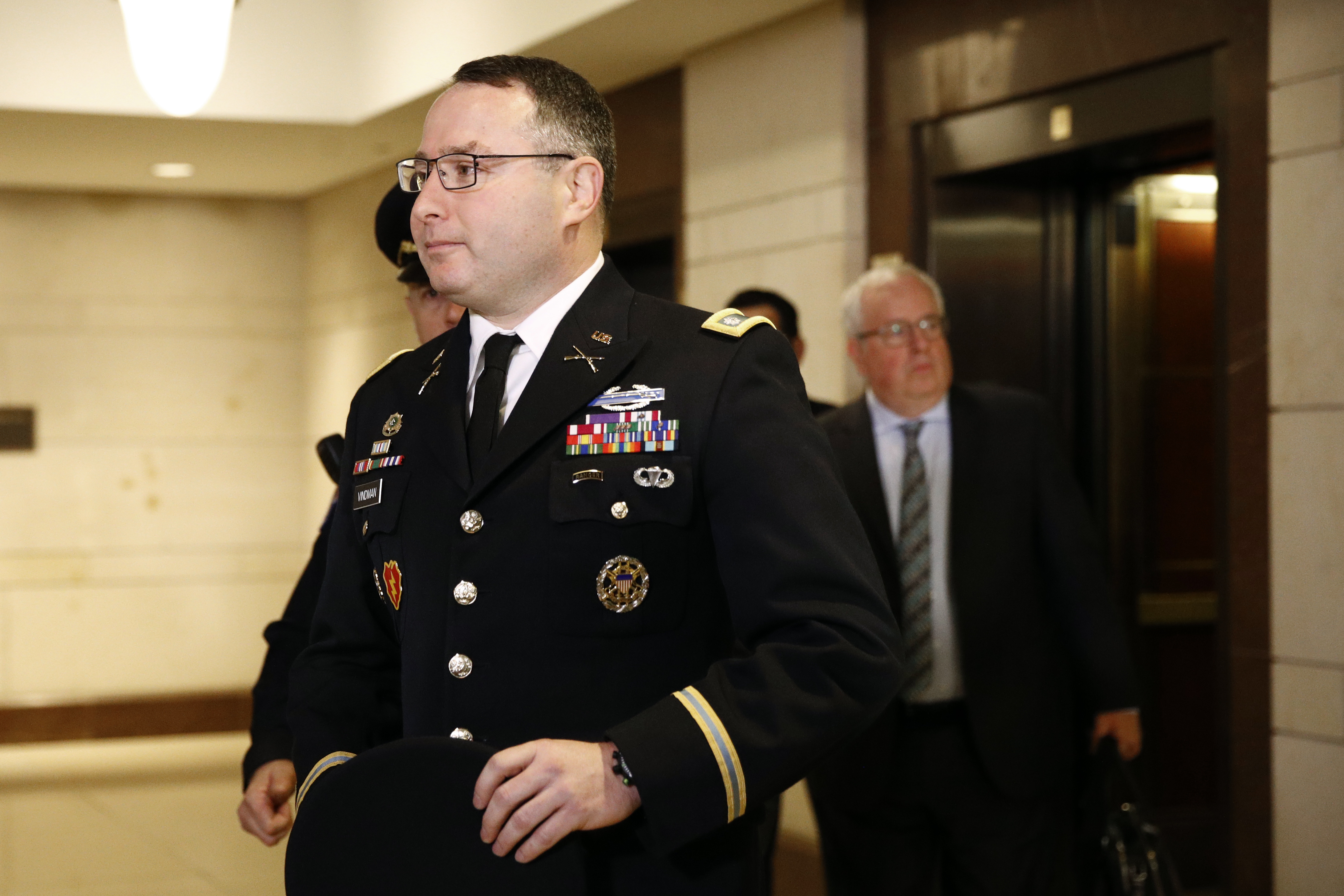 (Patrick Semansky | AP) Army Lieutenant Colonel Alexander Vindman, a military officer at the National Security Council, center, arrives on Capitol Hill in Washington, Tuesday, Oct. 29, 2019, to appear before a House Committee on Foreign Affairs, Permanent Select Committee on Intelligence, and Committee on Oversight and Reform joint interview with the transcript to be part of the impeachment inquiry into President Donald Trump.