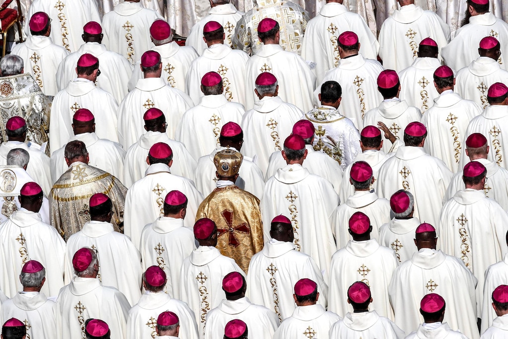 (Giuseppe Lami/ANSA via AP) Bishops attend a canonization ceremony in St. Peter's Square at the Vatican, Sunday, Oct. 14, 2018. Pope Francis declared Pope Paul VI and slain Salvadoran Archbishop Oscar Romero saints, reciting in Latin the rite of canonization at the start of Mass in St. Peter's Square. After hearing brief biographies of Paul, Romero and five other people canonized Sunday, Francis declared them saints and "decreed that they are to be venerated as such by the whole church."