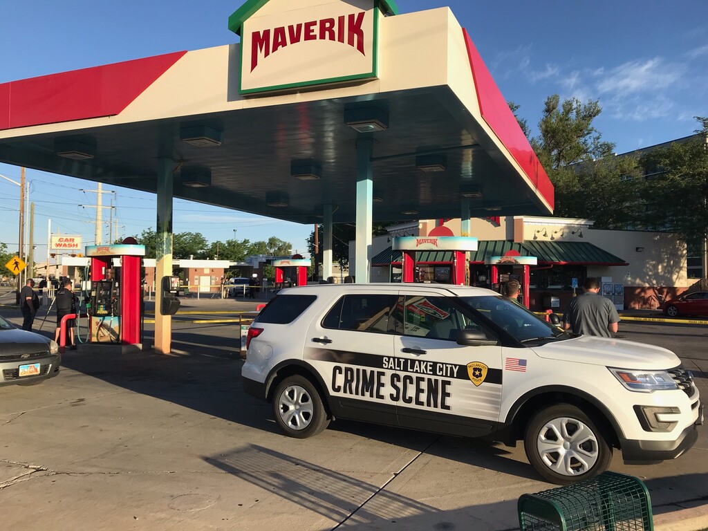 (Nate Carlisle | Salt Lake Tribune) Salt Lake City police on July 3, 2019, investigate stabbings that killed one person and injured a second at a Maverik station at 1300 South and Main Street.