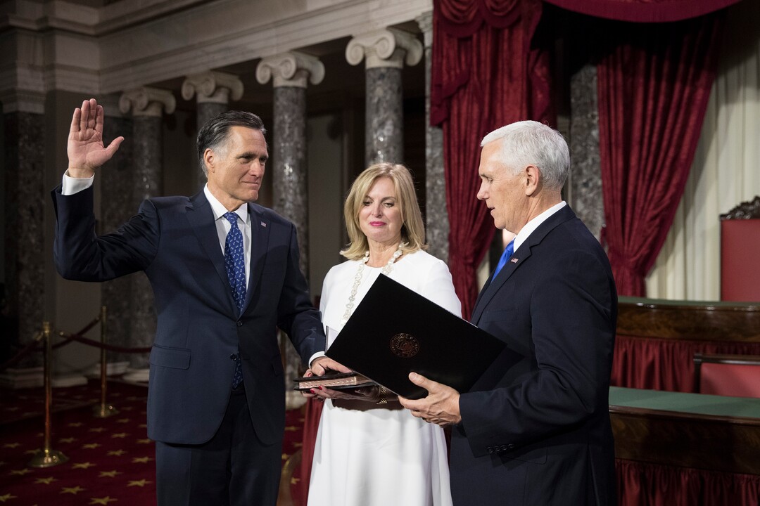 (Sarah Silbiger  |  The New York Times) Sen. Mitt Romney (R-Utah), accompanied by his wife, Ann Romney, during a ceremonial swearing-in to the 116th Congress, with Vice President Mike Pence  in the Old Senate Chambers of the U.S. Capitol in Washington, Jan. 3, 2019. 