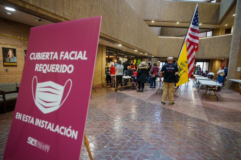 (Trent Nelson  |  The Salt Lake Tribune) People gather as the Salt Lake County Council holds a brief meeting on the mask mandate, in Salt Lake City on Thursday, Jan. 13, 2022.