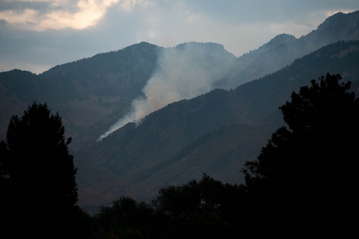 (Francisco Kjolseth  |  The Salt Lake Tribune) Crews battle a fire in Neffs Canyon on the north side of Mount Olympus on Tuesday, Sept, 22, 2020, that started the night before.
