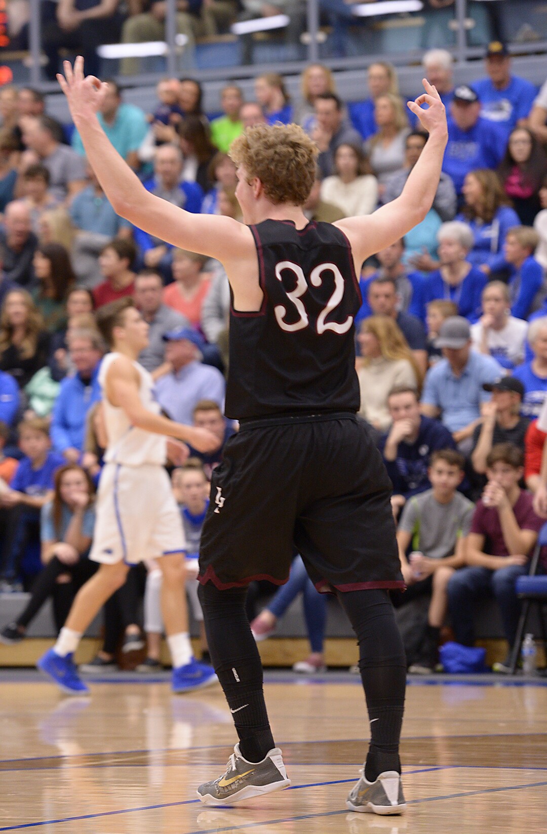 (Leah Hogsten  |  The Salt Lake Tribune) Lone Peak's  Taylor Madsen celebrates back-to-back 3-pointers. Lone Peak High School boys' basketball team defeated Pleasant Grove High School 65-61 during their game Friday, January 26, 2018 in Pleasant Grove. 