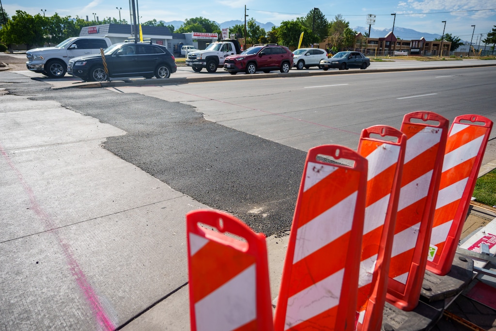 (Trent Nelson  |  The Salt Lake Tribune)
A patched segment of Redwood Road at North Temple that had buckled from heat in Salt Lake City, on Monday July 17, 2023. On Saturday, Salt Lake City's high temperature of 106 degrees set a July 22 record.