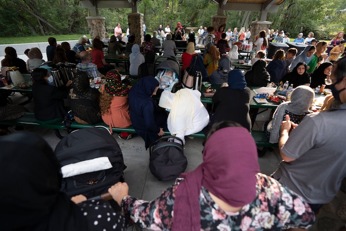 (Rick Egan | The Salt Lake Tribune) 
Afghans gather at Murray Park for a prayer vigil in honor of UtahÕs Afghan refugees, on Saturday, Aug. 21, 2021.