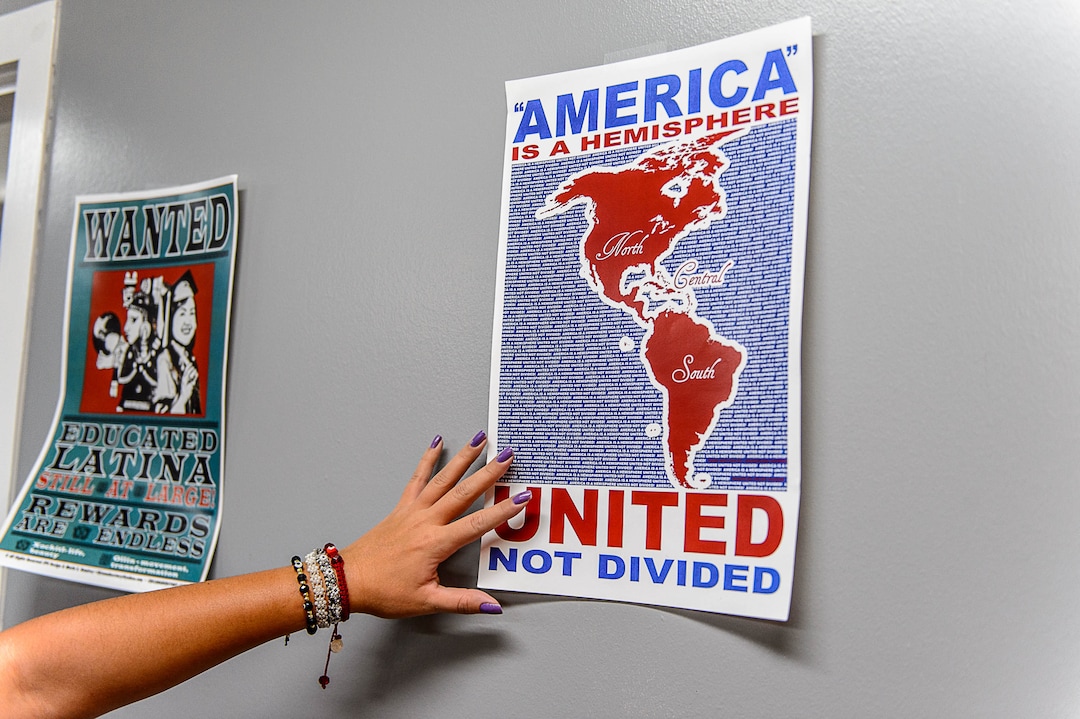 (Trent Nelson  |  The Salt Lake Tribune)  Brianda Galeana puts up posters at the University of Utah's new Dream Center, Friday August 18, 2017.