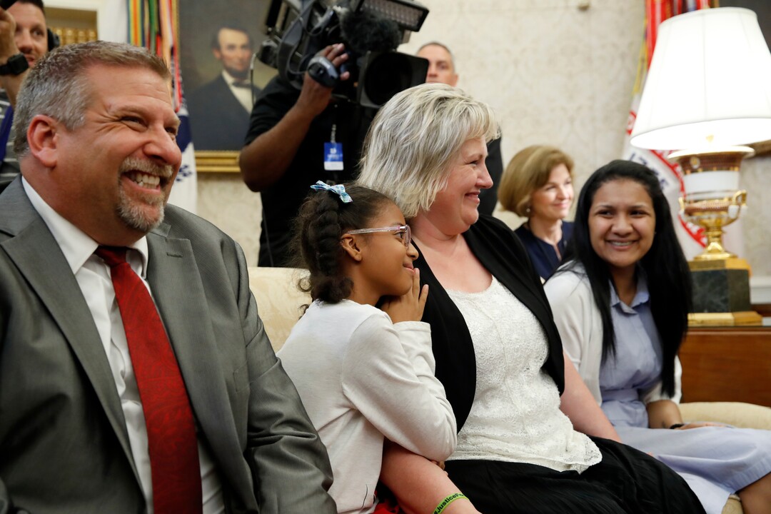 (Alex Brandon  |  AP Photo)  The family of Joshua Holt, who was recently released from a prison in Venezuela, father Jason Holt, left; daughter, Marian Leal; mother, Laurie Holt, and his wife, Thamara Holt, right, sit on a couch in the Oval Office of the White House during a news conference on Saturday, May 26, 2018, in Washington.