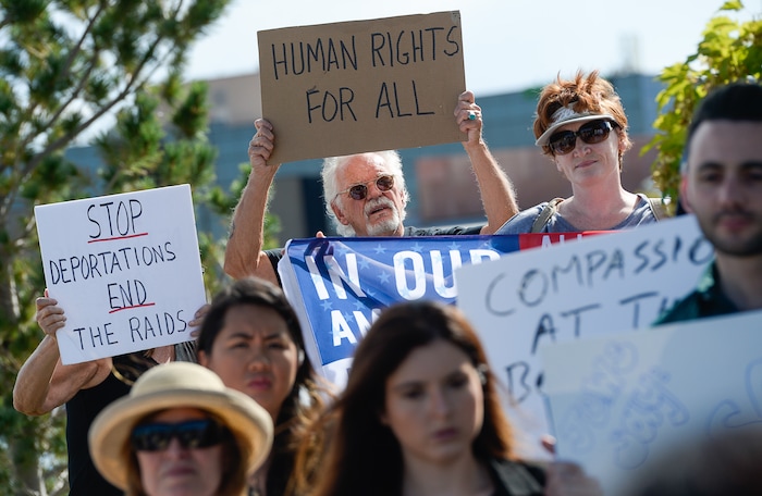 (Francisco Kjolseth  |  The Salt Lake Tribune)  Utah Jewish Community organizations, their members and friends gather outside of the U.S. Immigration and Customs Enforcement (ICE) field office at 2975 S. Decker Lake Drive in West Valley City, on Saturday, Aug. 10, 2019, for a Close The Camps vigil and to condemn government policies that endanger, imprison and deport immigrants, refugees and asylum seekers.