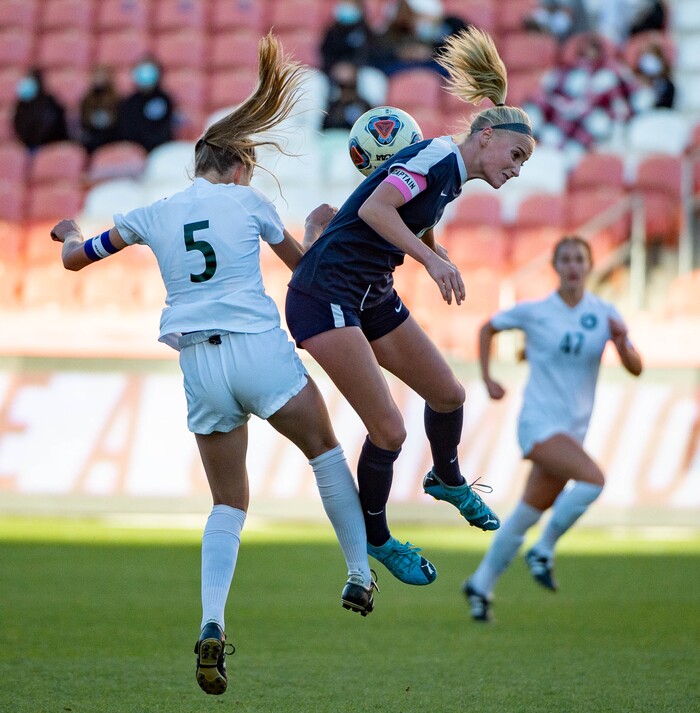 (Francisco Kjolseth  |  The Salt Lake Tribune) Lily Webster #5 of Olympus goes up for the header alongside Aspen Seaich #4 of Bonneville as they compete in their 5A high school girls championship game at Rio Tinto Stadium in Sandy on Friday, Oct. 23, 2020. Bonneville went on to win 1-0 in overtime.