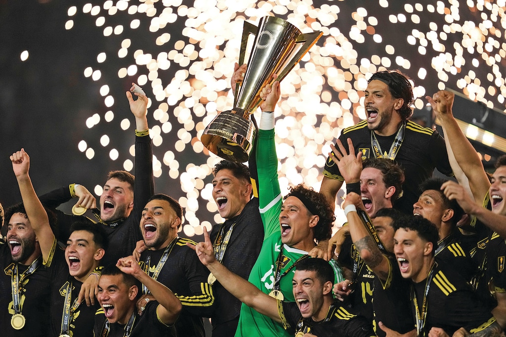 Mexico players and staff celebrate after their win in the CONCACAF Gold Cup final soccer match against the United States in Houston, Sunday, July 6, 2025. (AP Photo/Ashley Landis)