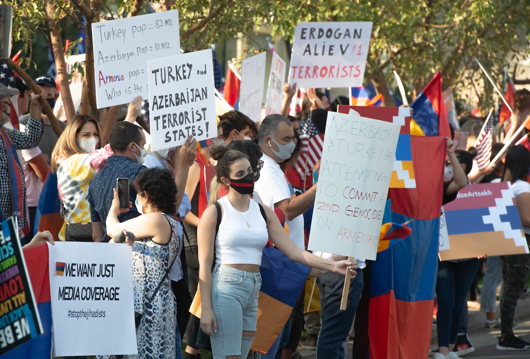 (Francisco Kjolseth  |  The Salt Lake Tribune) A group denouncing Azerbaijan and Turkish president Recep Tayyip Erdogan join those supporting President Donald Trump as they rally outside of Kingsbury Hall on the University of Utah campus in Salt Lake City on Wednesday, Oct. 7, 2020, before the vice presidential debate.