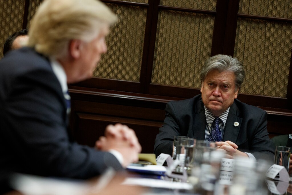 Then-White House Chief Strategist Steve Bannon listens as President Donald Trump speaks during a meeting on cyber security in the Roosevelt Room of the White House in Washington, Tuesday, Jan. 31, 2017. (AP Photo/Evan Vucci, File)