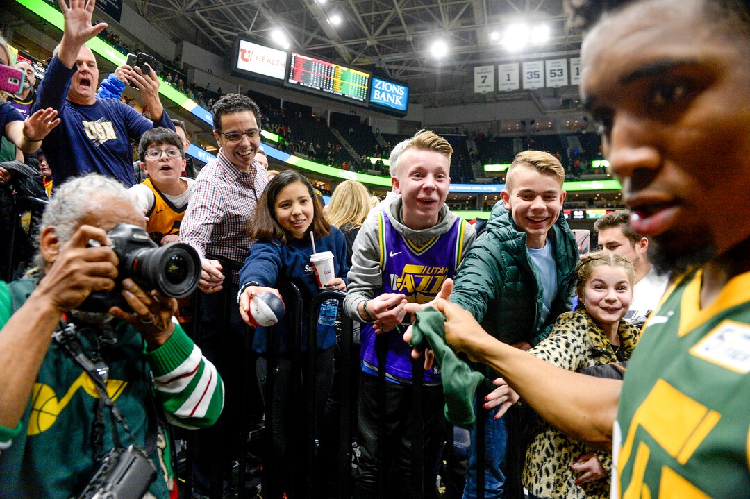 Leah Hogsten  |  The Salt Lake Tribune  Utah Jazz guard Donovan Mitchell (45) celebrates the win with fans. The Utah Jazz defeated the Portland Trail Blazers, 117-96, Christmas night at Vivint Smart Home Arena.