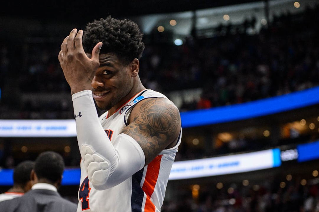 (Trent Nelson | The Salt Lake Tribune)  Auburn Tigers guard Malik Dunbar (4) shows a sheepish smile after a very close win, as Auburn faces New Mexico State in the 2019 NCAA Tournament in Salt Lake City on Thursday March 21, 2019.