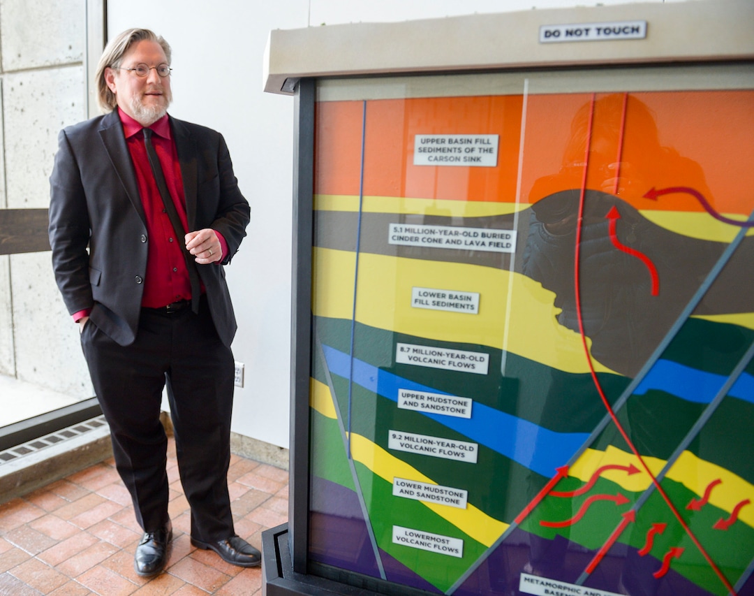 (Leah Hogsten | The Salt Lake Tribune)  Keith Diaz-Moore, dean of the University of Utah's College of Architecture and Planning and the interim Chief Sustainability Officer, looks at a model showing the closed circuit, geothermal power generating plant located in Soda Lake, Nev. The geothermal plant generates electricity for the University of Utah. The U. gets more than half of its electricity through renewable sources, namely solar and geothermal power.