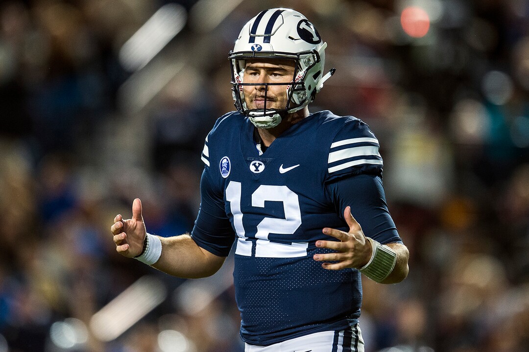 (Chris Detrick  |  The Salt Lake Tribune)  Brigham Young Cougars quarterback Tanner Mangum (12) walks off of the field during the game LaVell Edwards Stadium Friday, October 6, 2017. 