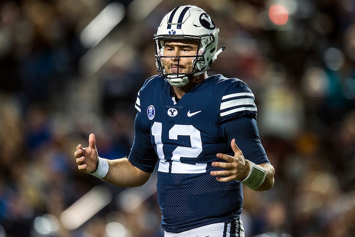 (Chris Detrick  |  The Salt Lake Tribune)  Brigham Young Cougars quarterback Tanner Mangum (12) walks off of the field during the game LaVell Edwards Stadium Friday, October 6, 2017. 
