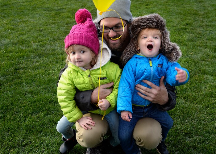 (Scott Sommerdorf | The Salt Lake Tribune)
Jerimiah Clark holds his daughter Eliana, left, and son Martin as the balloons launch at the 4th annual Autumn Aloft Hot Air Balloon Festival in Park City, Sunday, September 17, 2017.
