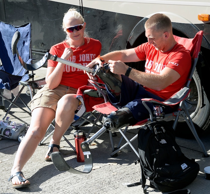 (Al Hartmann | The Salt Lake Tribune)
Rob Jones, a retired Marine Corps Sergeant who lost both legs when he stepped on an improvised explosive device in Afghanistan, attaches his prosthetic legs to run a marathon, (26.2) miles in Liberty Park in Salt Lake City Wednesday Oct. 25. He won a Bronze Medal in the Paralympics and he wis the first and only double above the knee amputee to ride a normal bicycle 5,180 miles across America. Now, he is set to run 31 marathons in 31 days in 31 major cities. Starting in London on October 12th, and continuing in the United States and Toronto, he will run 26.2 miles in the selected city on his own, travel to the next city, and repeat, ending appropriately on Veterans Day in our Nation’s Capital. His motto, “Survive. Recover. Live.”
