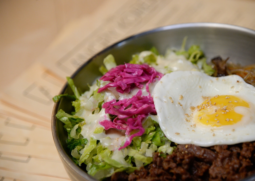 (Francisco Kjolseth  |  The Salt Lake Tribune)  Rice bowls served with house salad and a choices of protein are served at the Angry Korean fusion restaurant in South Jordan.