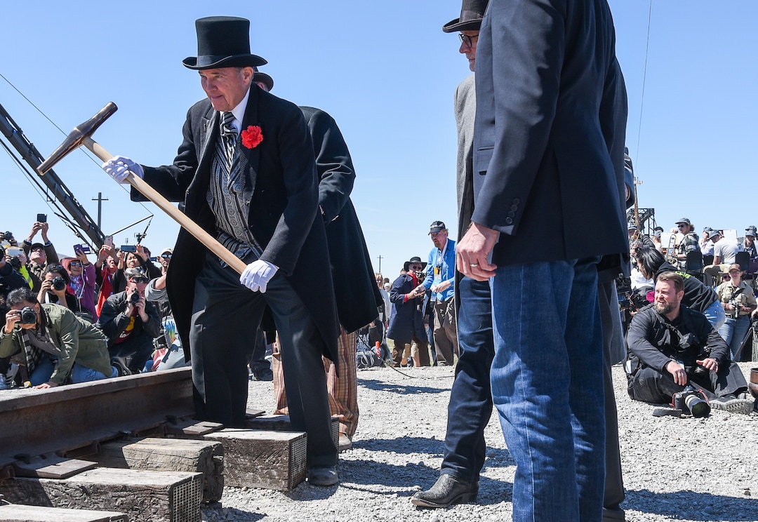 (Francisco Kjolseth  |  The Salt Lake Tribune)  Utah Governor Gary Herbert delivers one of the symbolic strikes on Friday May 10, 2019, in celebration of the 150th anniversary of the completion of the transcontinental railroad at Promontory Summit where the two rails met back on May 10, 1869.