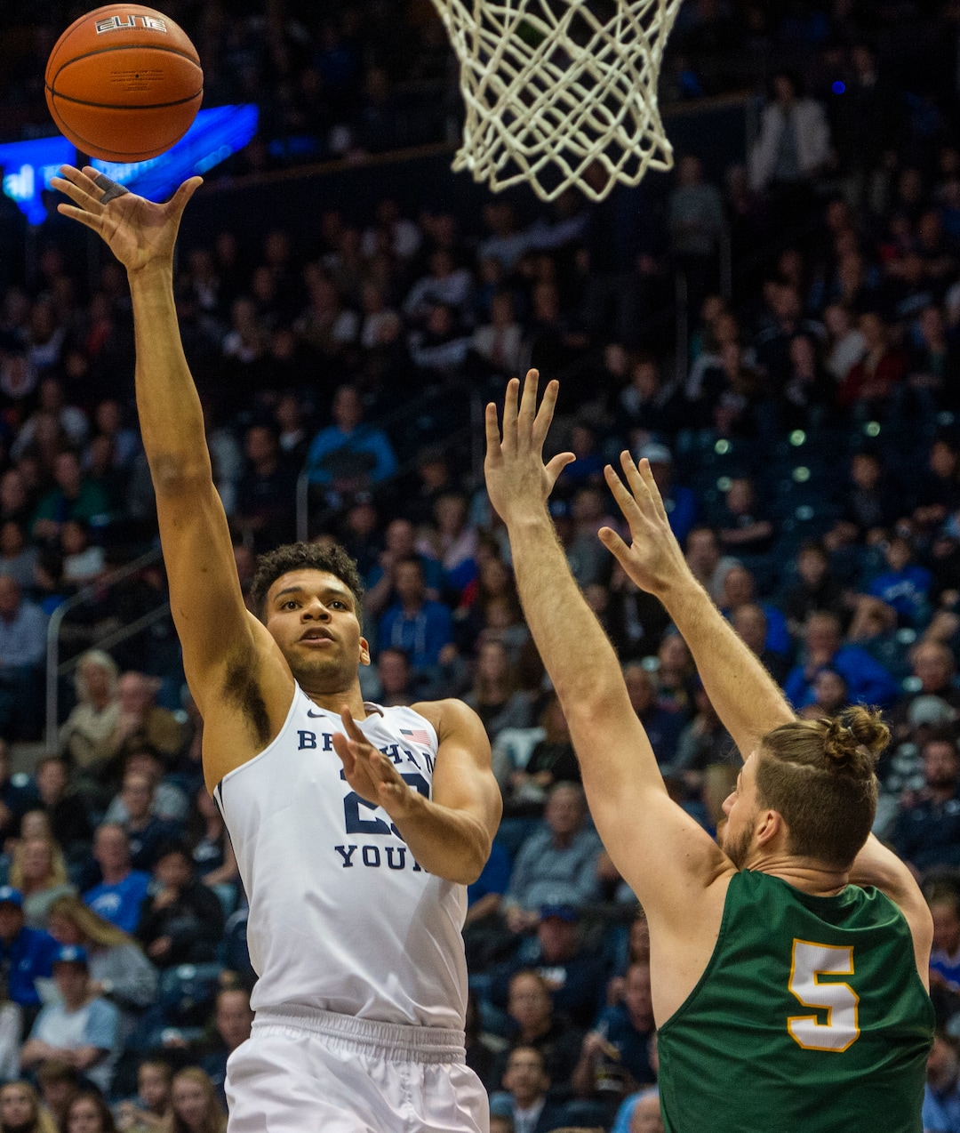 (Rick Egan  |  The Salt Lake Tribune)     Brigham Young Cougars forward Yoeli Childs (23) shoots overSan Francisco Dons center Jimbo Lull (5), in West Coast Conference basketball acton between the Brigham Young Cougars and the San Francisco Dons, at the Marriott Center, Saturday, Feb. 8, 2020.