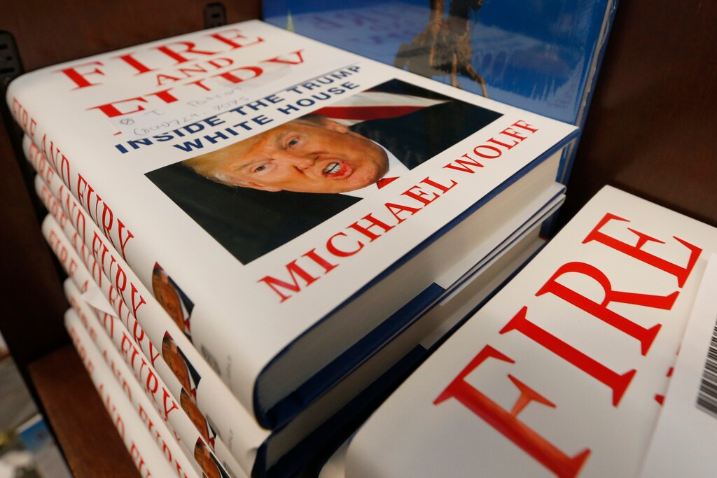 A stack of reserved "Fire and Fury" books by writer Michael Wolff sit on a shelf in a bookstore in Richmond, Va., Friday, Jan. 5, 2018. The new book on President Donald Trump is drawn from what he said was regular access to the West Wing and more than 200 interviews, including some three hours with Trump himself. (AP Photo/Steve Helber)