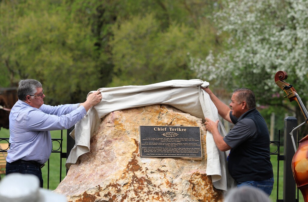 (Emily Anderson | Standard-Examiner via AP) Former Northwestern Band of Shoshone Chairman Darren Parry, right, is shown in Harrisville on Saturday, May 1, 2021, unveiling a monument. The monument marked the spot Shoshone Chief Terikee was killed by a pioneer settler in Harrisville.