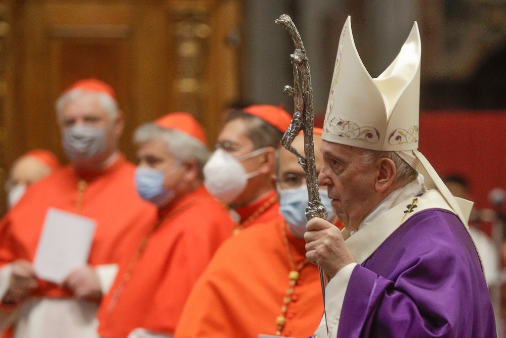 (Gregorio Borgia | AP) Pope Francis holds his pastoral staff as he arrives to celebrate Mass, at St. Peter's Basilica, Sunday, Nov. 29, 2020. Pope Francis has changed church law to explicitly allow women to do more things during Mass, Monday, Jan. 11, 2021, while reaffirming they cannot be priests.