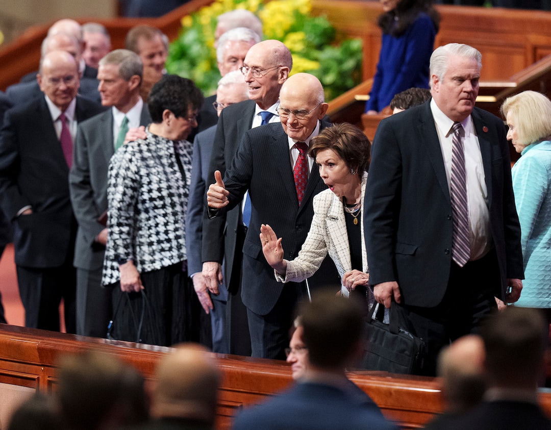 (Leah Hogsten | The Salt Lake Tribune) The Church of Jesus Christ of Latter-day Saints President Dallin H. Oaks and his wife, Kristen, wave to friends as they leave the morning session of General Conference on Saturday, April 1, 2023.