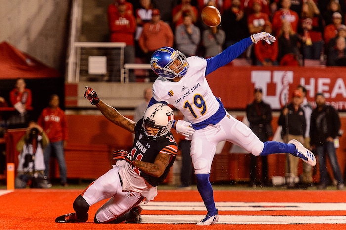 (Trent Nelson | The Salt Lake Tribune) San Jose State Spartans cornerback Dakari Monroe (19) knocks the ball away from Utah Utes wide receiver Raelon Singleton (11) as the Utah Utes host the San Jose State Spartans, NCAA football at Rice-Eccles Stadium in Salt Lake City, Saturday September 16, 2017.