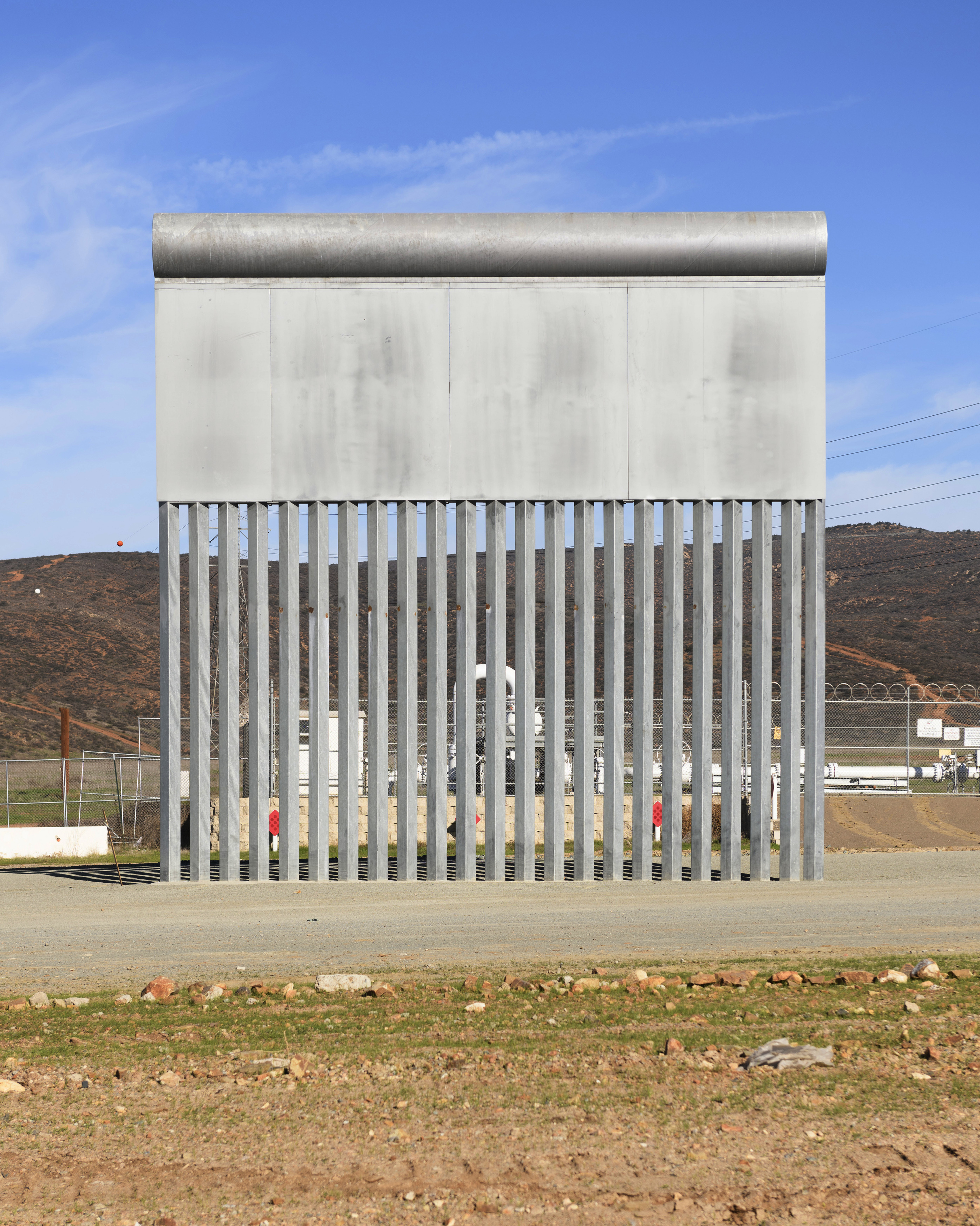 A border wall prototype stands in San Diego near the Mexico-U.S. border, seen from Tijuana, Mexico, Saturday, Dec. 22, 2018. (AP Photo/Daniel Ochoa de Olza)