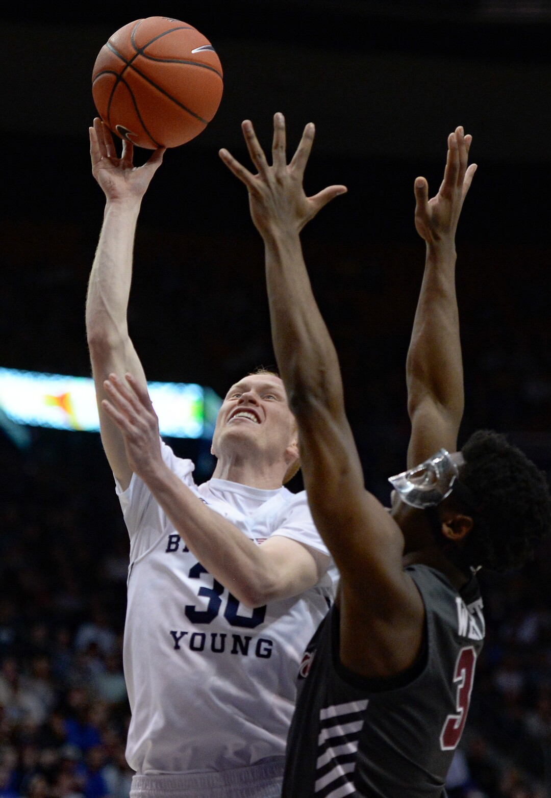 (Francisco Kjolseth  |  The Salt Lake Tribune) Brigham Young Cougars guard TJ Haws (30) goes past Santa Clara Broncos guard Trey Wertz (3) in the second half as the Brigham Young Cougars host the Santa Clara Broncos at the Marriott Center in Provo, Thursday, Feb. 20, 2020. BYU won 85-75.