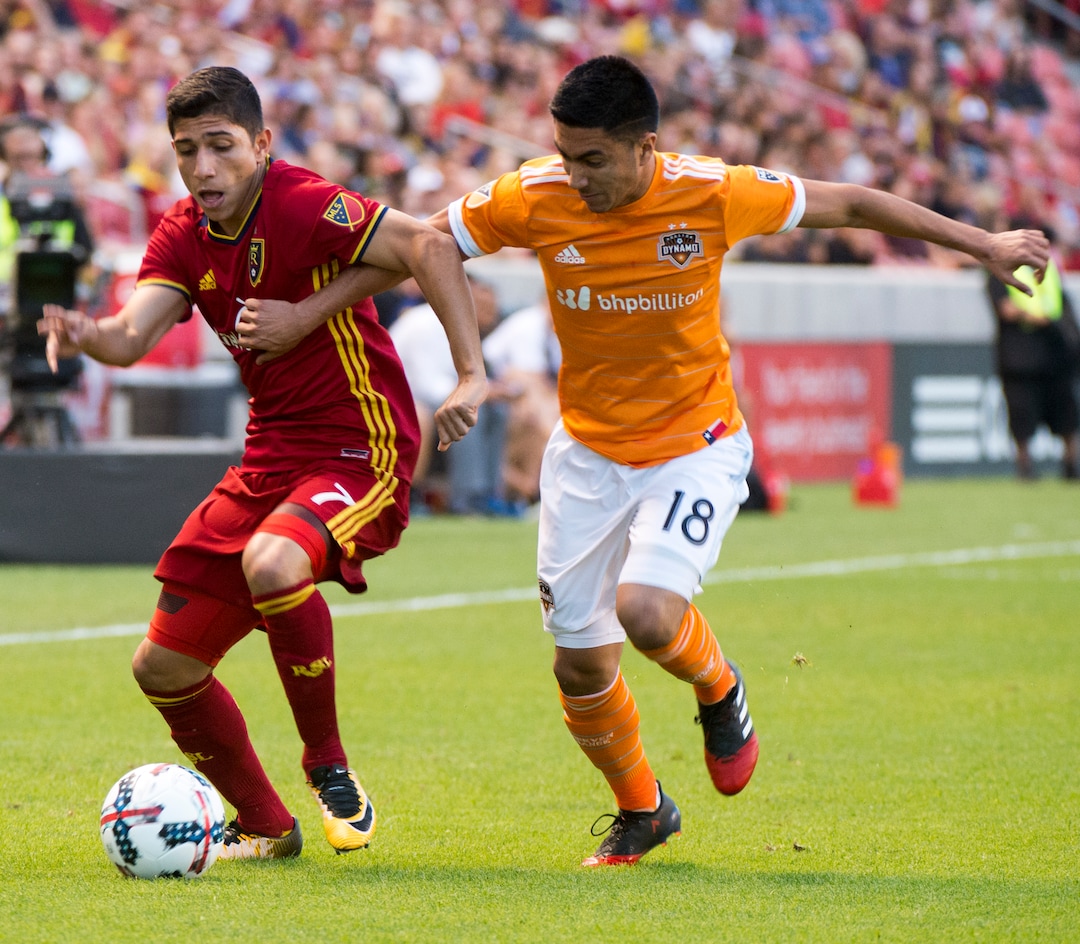 (Rick Egan  |  The Salt Lake Tribune)  Real Salt Lake forward Jefferson Savarino (7) goes for the ball along with Houston Dynamo midfielder Memo Rodriguez (18), in MLS action, Real Salt Lake Vs. Houston Dynamo, in Sandy, Saturday, August 5, 2017.