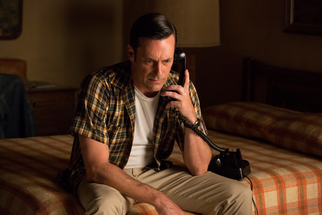 In this image released by AMC, Jon Hamm portrays Don Draper in a scene from "Mad Men." Hamm is nominated for an Emmy Award for outstanding lead actor in a drama series. The 67th annual Primetime Emmy Awards will be held on Sunday, Sept. 20, 2015, in Los Angeles. (Michael Yarish/AMC via AP)