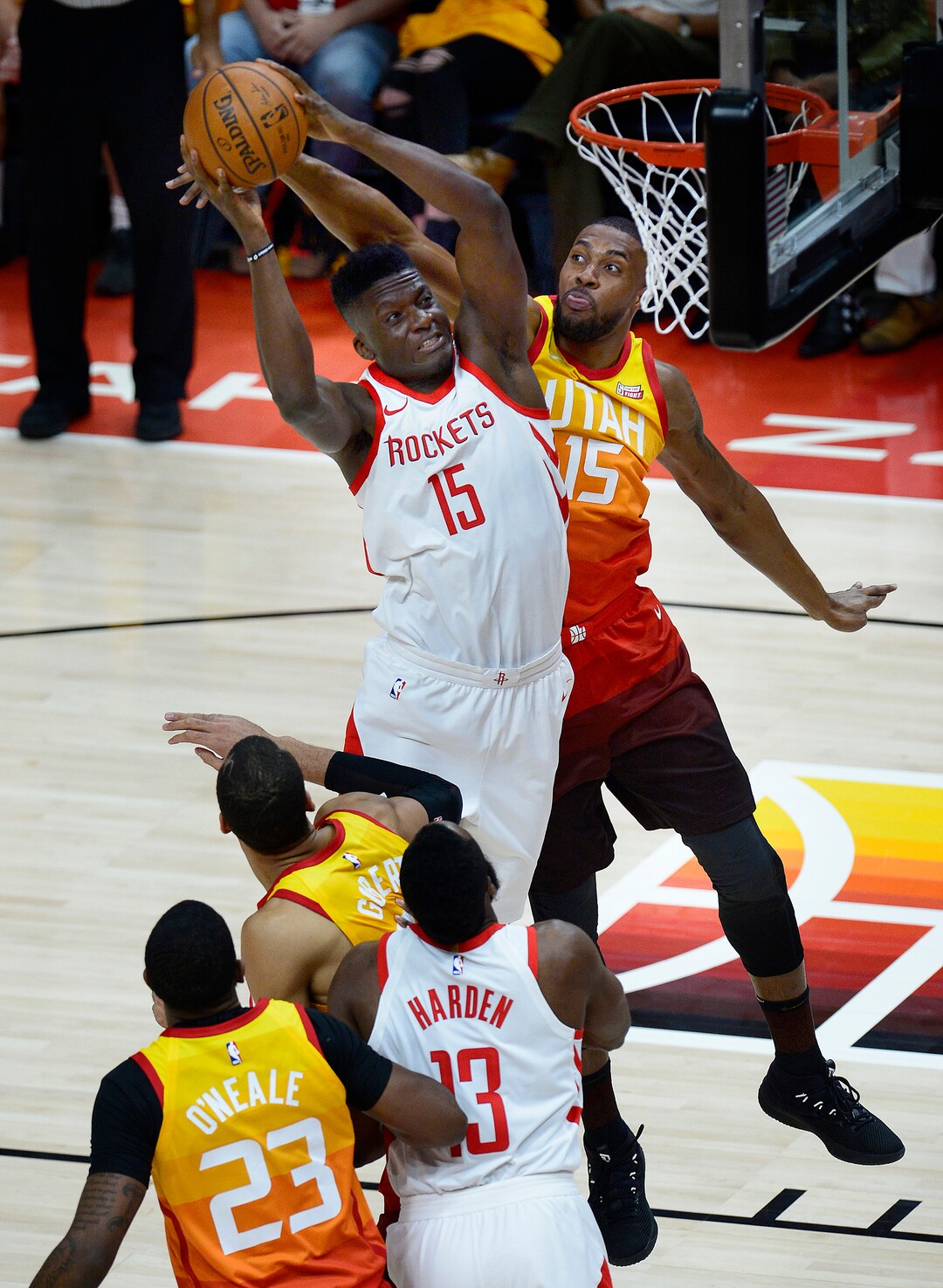 Utah Jazz forward Derrick Favors (15) tries to block the shot of Houston Rockets center Clint Capela (15) during first half play. The Houston Rockets led the Utah Jazz 70-40 at the half of game 3, Friday, May 4, 2018.