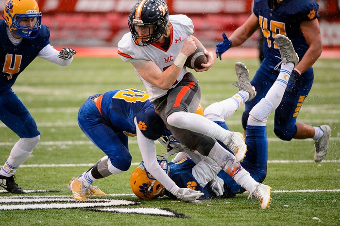 (Trent Nelson | The Salt Lake Tribune)  Mountain Crest's Beau Robinson (7) runs the ball as Orem faces Mountain Crest in the Class 4A High School State Football Championship game in Salt Lake City, Friday November 17, 2017.