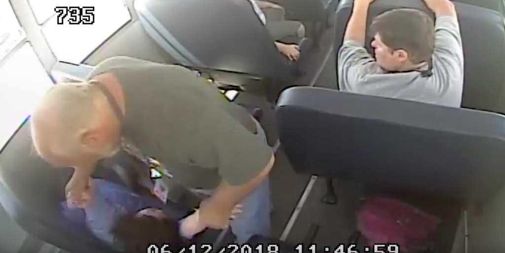 (Image courtesy of the Disability Law Center) In this screenshot from a surveillance video, driver Gary Bertagnole is seen grabbing a girl with autism. Her family is now suing.