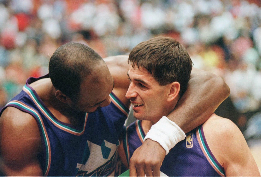 (Rick Egan  |  Tribune file photo) Karl Malone and John Stockton share a moment on the court in this 1997 photo.