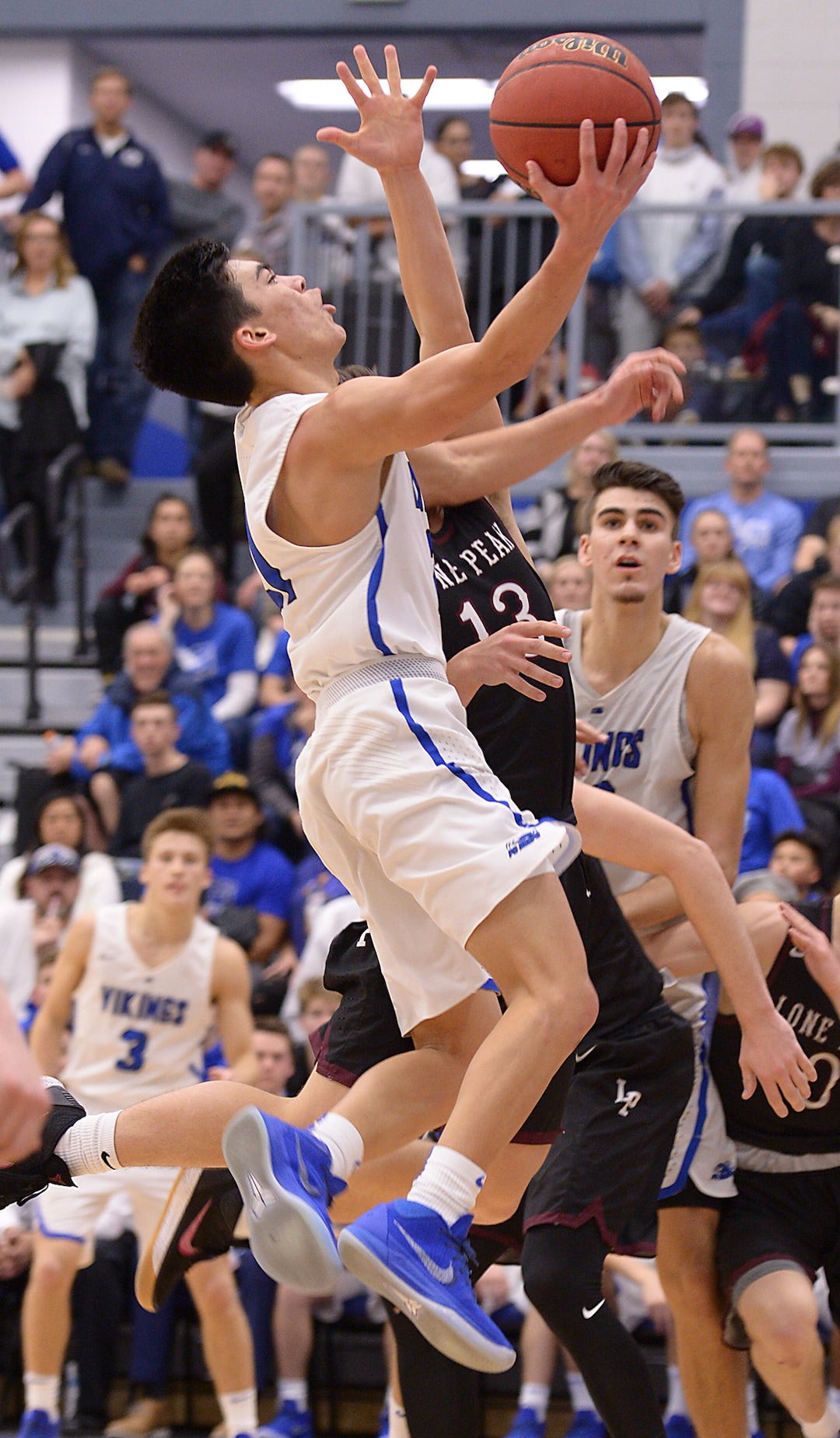 (Leah Hogsten  |  The Salt Lake Tribune)  Pleasant Grove's Kawika Akina.  Lone Peak High School boys' basketball team defeated Pleasant Grove High School 65-61 during their game Friday, January 26, 2018 in Pleasant Grove. 
