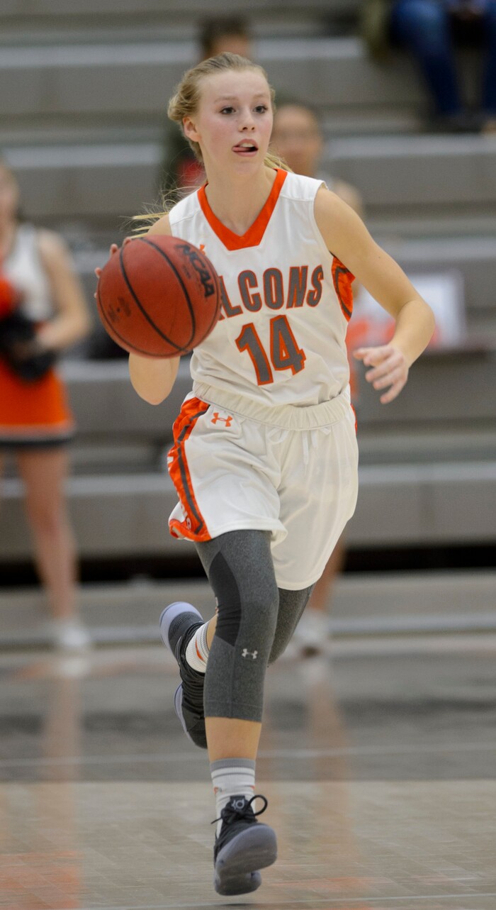 (Steve Griffin  |  The Salt Lake Tribune)  Skyridge guard Kylee Holland brings the ball up court during game against Hillcrest at Skyridge High School in Lehi, Utah Wednesday December 13, 2017.