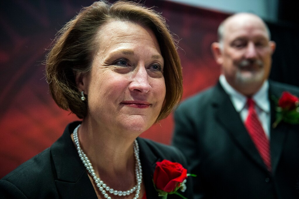 (Chris Detrick | The Salt Lake Tribune) Ruth Watkins, flanked by her husband Bob Young, speaks to members of the media after being introduced as the new president of the University of Utah at Rice-Eccles Stadium Thursday, January 18, 2018. Once Watkins' appointment is finalized, she will be the first female president of the state's flagship campus.