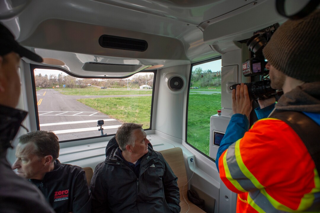 (Rick Egan  |  The Salt Lake Tribune)    Media members take a ride on the Autonomous Shuttle for a test drive, at the test track is across the street from UDOT headquarters on the west side of 2700 West. Thursday, April 11, 2019.