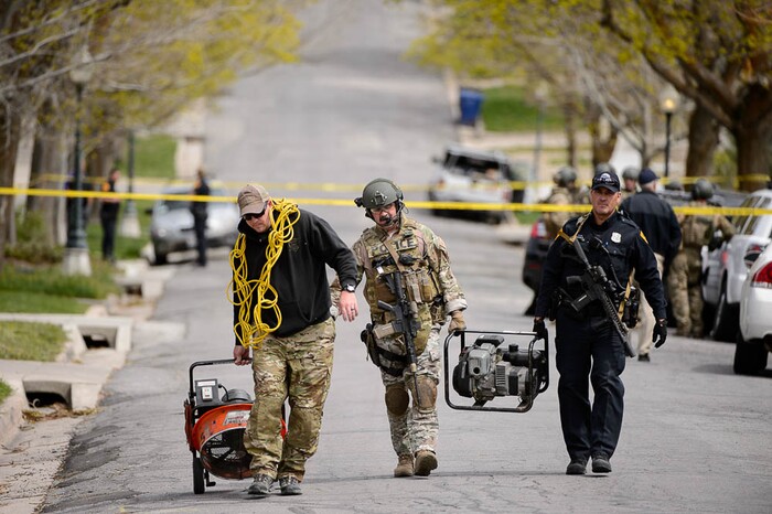 (Trent Nelson | The Salt Lake Tribune)  
Law enforcement at the scene after an incident where a man barricaded himself in a house on Princeton Avenue near 1100 East in Salt Lake City, Wednesday April 18, 2018.