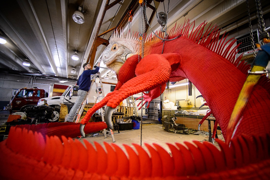 (Trent Nelson | The Salt Lake Tribune)  Artist Stephen Kesler works recently on a giant Red Iguana, to be placed in front of the Salt Lake City restaurant's #2 location. Kesler created the giant whales and other sea creatures for the Living Planet Aquarium. The Red Iguana is 14 feet high and more than 30 feet long.