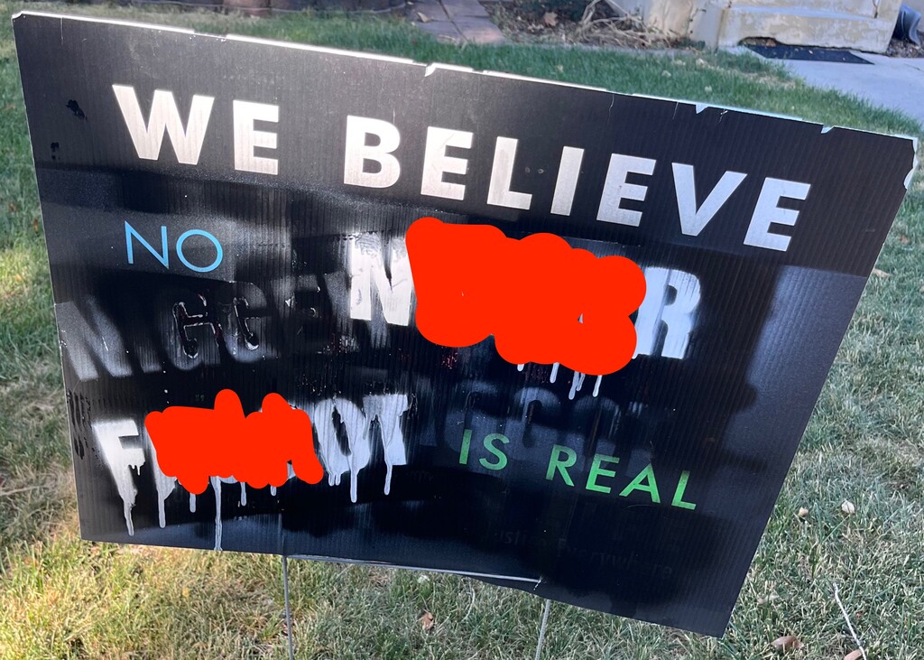 A sign left in the yard of a Salt Lake Tribune reporter in October 2022.