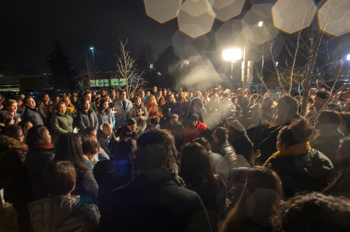 (Rick Egan  |  The Salt Lake Tribune)       Snow falls, as BYU students listen to Buffalo Junior as they sing and drum, at the Tanner building for a candlelight vigil on BYU campus, for the student who died by suicide this week, Friday, Dec. 7, 2018.
  
